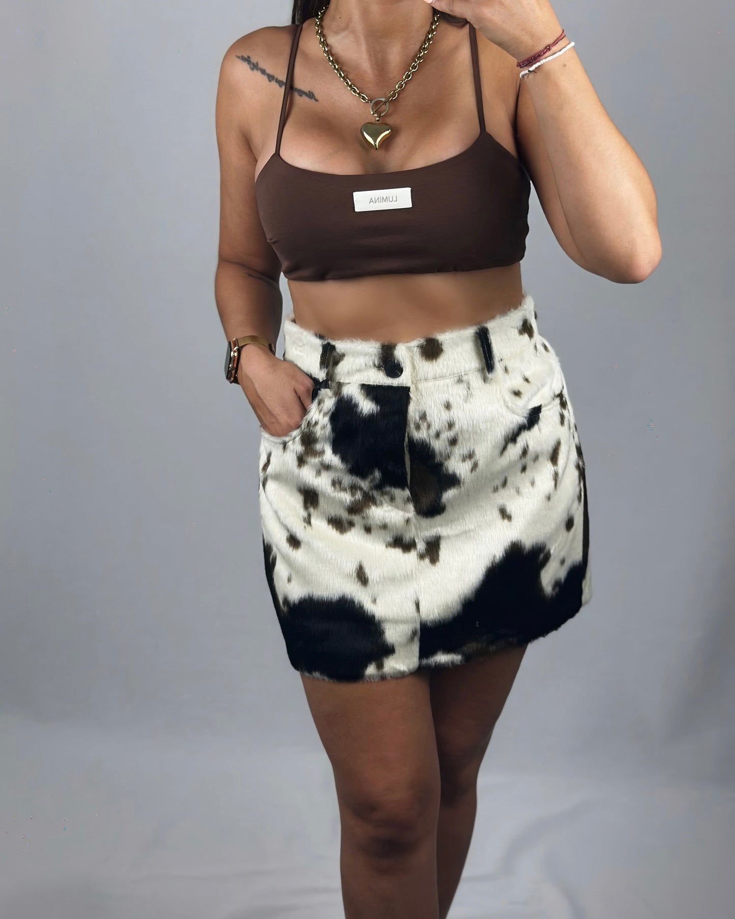 FALDA COW PELO LUM