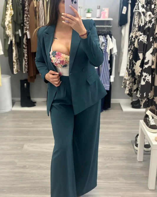 TRAJE PETRÓLEO